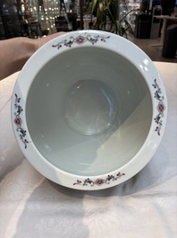 Seven Chinese famille rose vases, a scroll jar and a jardini&egrave;re on a stand, Qianlong marks, 20th C.