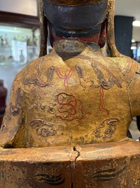 A large Chinese gilt-lacquered and polychrome wooden figure of Guandi, 19th C.