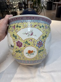 Seven Chinese famille rose vases, a scroll jar and a jardini&egrave;re on a stand, Qianlong marks, 20th C.