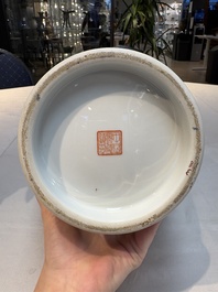 Seven Chinese famille rose vases, a scroll jar and a jardini&egrave;re on a stand, Qianlong marks, 20th C.