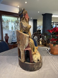 A large Chinese gilt-lacquered and polychrome wooden figure of Guandi, 19th C.