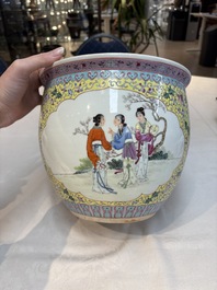 Seven Chinese famille rose vases, a scroll jar and a jardini&egrave;re on a stand, Qianlong marks, 20th C.