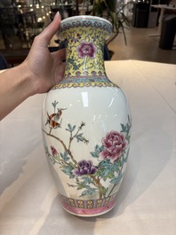 Seven Chinese famille rose vases, a scroll jar and a jardini&egrave;re on a stand, Qianlong marks, 20th C.