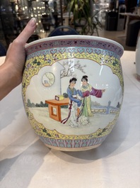 Seven Chinese famille rose vases, a scroll jar and a jardini&egrave;re on a stand, Qianlong marks, 20th C.