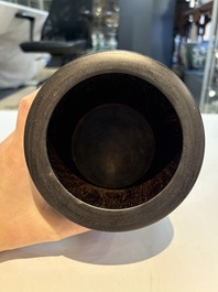 Two Chinese hardwooden brush pots, 20th C.