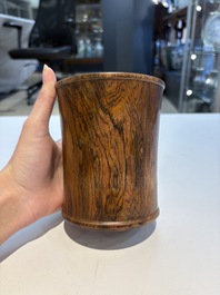 Two Chinese hardwooden brush pots, 20th C.