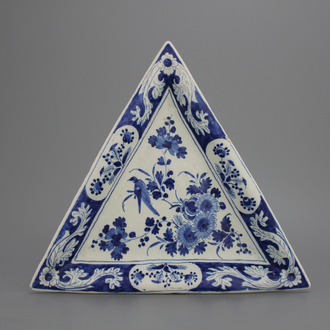An unusual triangular blue and white Dutch Delft plate, late 17th C.
