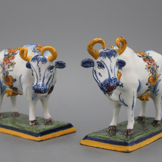 A wonderful pair of polychrome Dutch Delft cows, 18th C.