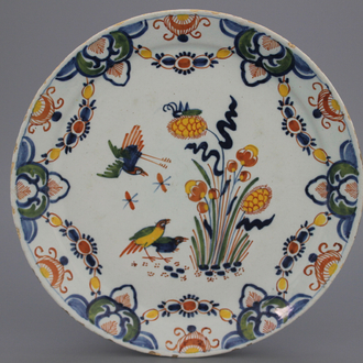 A polychrome Dutch Delft quail plate, early 18th C.