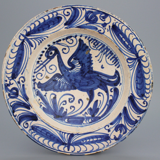 A blue and white Spanish Puente del Arzobispo plate with a crane, 1575-1600