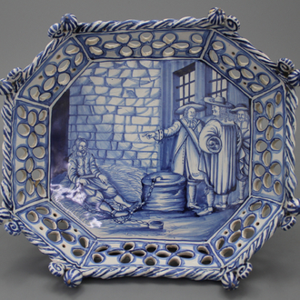 A Frankfurt Delftware ajour basket with a prison scene, dated 1679