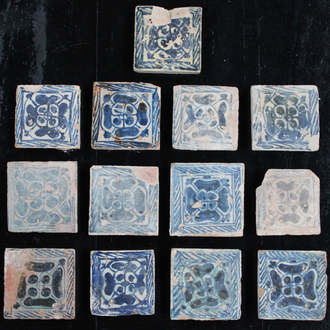 A set of 13 Manises blue and white tiles 15th C.