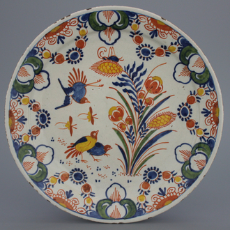 A polychrome Dutch Delft quail plate, 17/18th C.