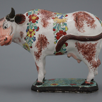 A petit feu and doré Dutch Delft cow, 18th C.