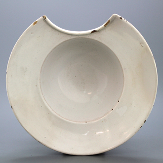A monochrome white Dutch Delft barber's bowl, 18th C.
