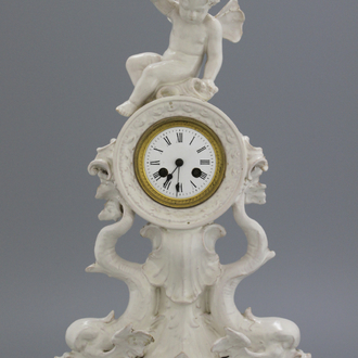 A large monochrome white, probably Brussels faienc clock, late 18th/early 19th C.