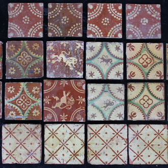 A lot of 20 various slipware decorated post-medieval tiles, 17/18th C., Franco-Flemish
