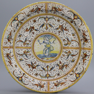 A massive Italian deruta charger with grotteschi depicting Prudence, ca. 1620