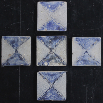 A group of 5 German Westerwald stoneware tiles, 17th C.