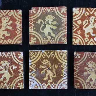 A lot of 6 slipware decorated post-medieval tiles with rampant lions, 17/18th C., Franco-Flemish