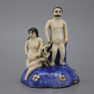 A Qadjar figural group with a nude man and woman with a dog, 19th C.