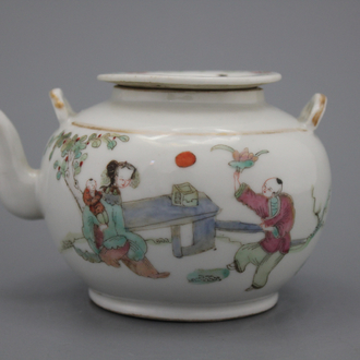 A Chinese porcelain famille rose tea pot, 19th C.