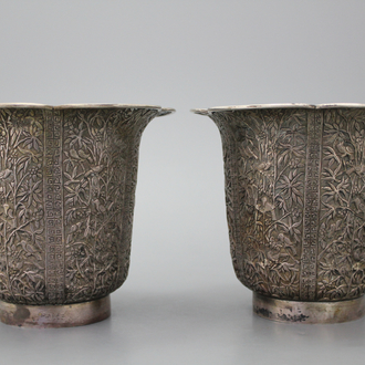 A pair of silver vases, Singapore or Cambodia, 20th C.