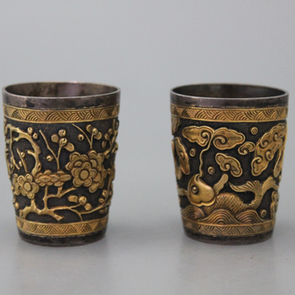 Paar Chinese zilveren en gouden wijn cup, ca. 1900