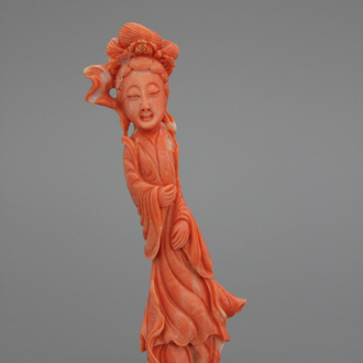 A carved Chinese red coral figure of a Guanyin, 19/20th C.