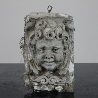 A plaster cast of an cherub's head, workshop De Wispelaere, Bruges, 1st half 20th C.