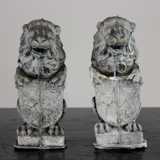A pair of plaster casts of lions, workshop De Wispelaere, Bruges, 1st half 20th C.