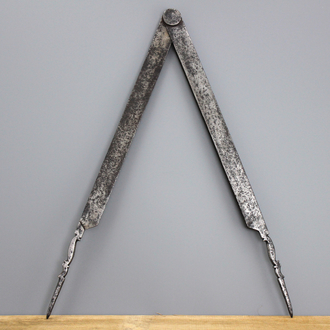 A large pair of iron compasses, 17/18th C.