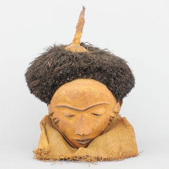 An African carved and painted Pende mask, early to mid 20th C.