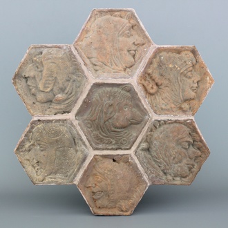 A field of 7 hexagonal relief-moulded ceiling tiles, Auvergne, France, 15th C.