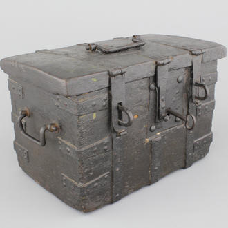 A cast iron and wood strong box, 17th C., The Netherlands