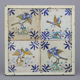 A framed set of 4 Dutch Delft polychrome tiles with birds, 17th C.