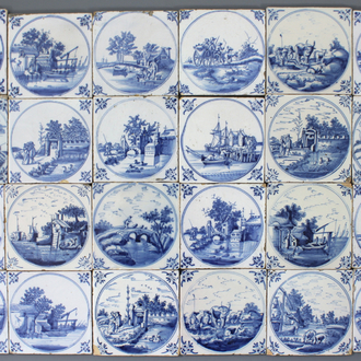 A set of 24 fine Dutch Delft blue and white medallion tiles, 18th C.