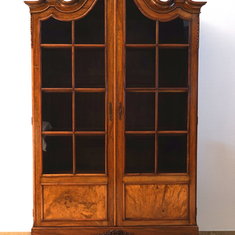 An English Chippendale style walnut veneer display cabinet, 19th C.