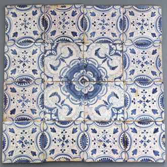 A set of 16 English Delft blue and white ornamental tiles, 17th C.