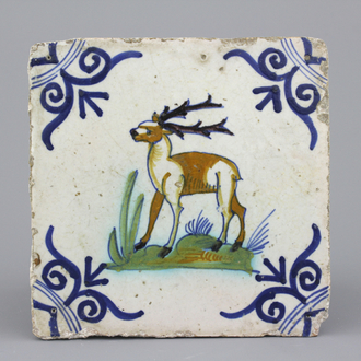 A polychrome Dutch Delft tile with a deer 17th C.
