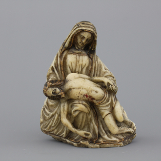 An alabaster sculpture of a pieta, 16/17th C.