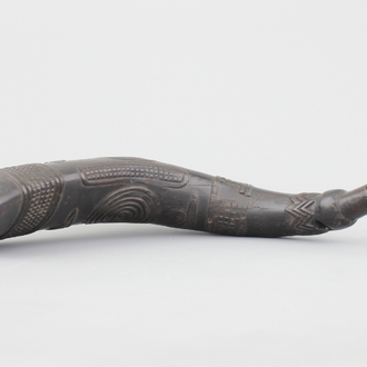 A large carved African Kuba drinking cup, carved and pierced buffalo horn, first half 20th C.