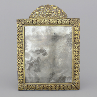 A Louis XIII gilt brass frame mirror, 17th C.