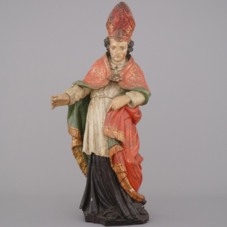 A polychrome carved wood figure of a bishop, 18th C.