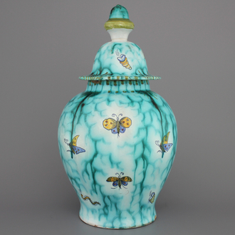 A rare Brussels faience vase and cover with butterflies, 18th C.