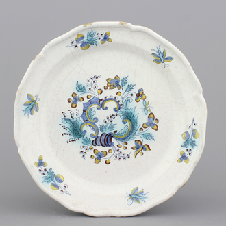 A Brussels faience rocaille plate, 18th C.