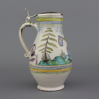 A German or Austrian faience beer jug with silver cover, ca. 1800