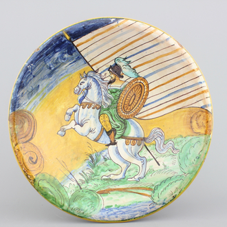A Montelupo maiolica dish with a knight on a horse, 19th C.