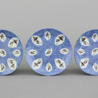 A set of 3 Brussels faience blue ground plates, 18th C.