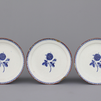 A set of 3 Dutch Delft plates with roses, 18th C.